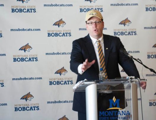 I cannot really think of many press conferences that introduced a new basketball coach that required him to wear a hat.  So this must be serious, right?